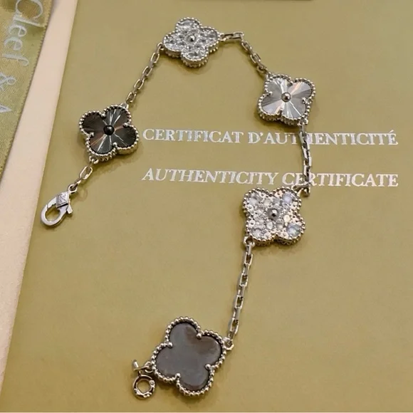 Van Cleef & Arpels Silver and Black Floral Bracelet